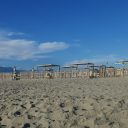 Torre del Lago i plaża dla psów i ich właścicieli